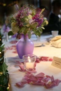 The head table with the bridesmaid bouquet