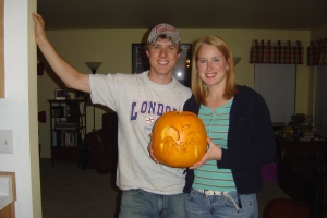 Travis and me with our pumpkin--can you tell I dyed my hair? Just a little darker...
